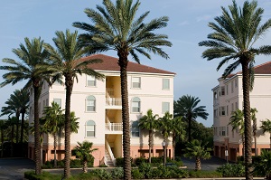 outside of a condo with palm trees